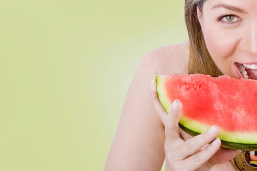 Woman eating watermelon
