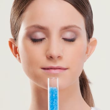 Woman smelling bath crystals