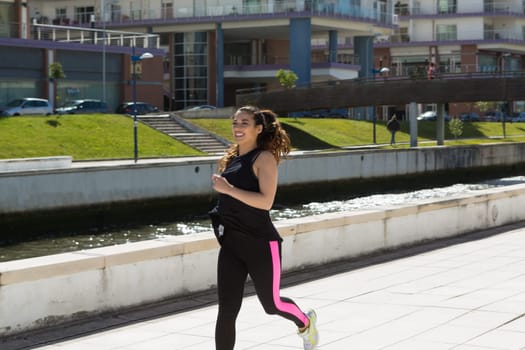 A beautiful young woman making some exercise at the park - fitness concept