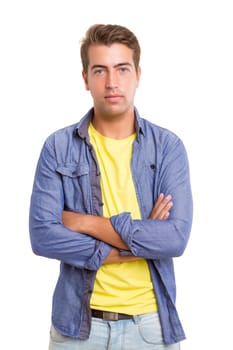 Studio picture of a young and handsome man posing isolated