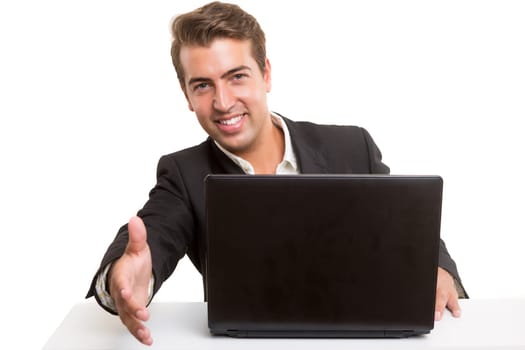 Young business man offering handshake