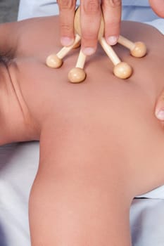 Person receiving acupressure treatment