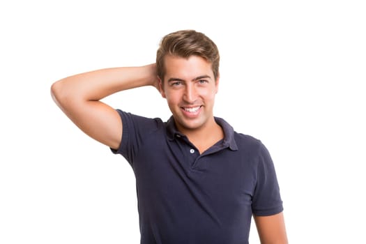 Studio picture of a young and handsome man posing isolated
