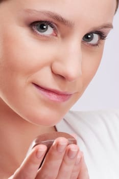 Woman holding a bar of soap