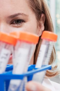 Female doctor holding medical samples in a laboratory