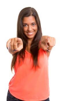 A beautiful woman pointing to something, isolated over a copy space background