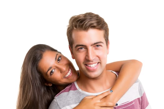 Young couple posing isolated in studio