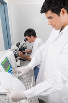 Two researchers working in a laboratory