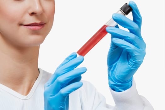 Female doctor holding a medical sample in a laboratory