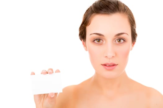 Beautiful fresh woman taking white card - blank. Dressing in pure white background