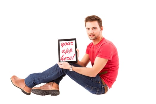Happy young man presenting your product in a tablet computer