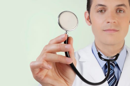 Portrait of a doctor holding a stethoscope