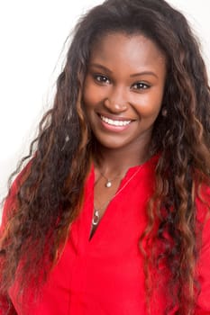 Beautiful young african woman posing isolated over white