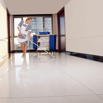 Janitor cleaning the corridor of a hospital