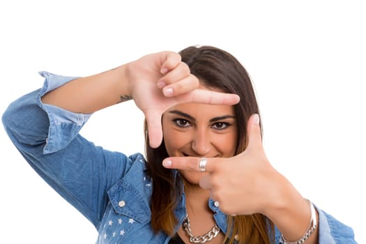 Young woman making framing key gesture - isolated over white