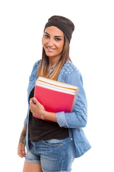Young student posing over a white background