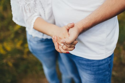 Lovely couple outdoor has romantic photo session. High quality photo