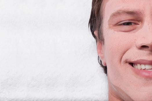 Man with face pack on his face