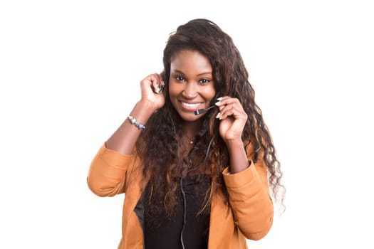A friendly african telephone operator smiling isolated over a white background