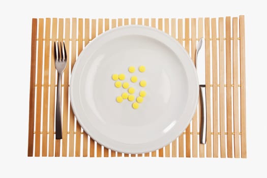 Close_up of pills on a plate