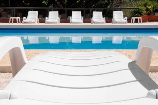 Lounge chairs at the poolside