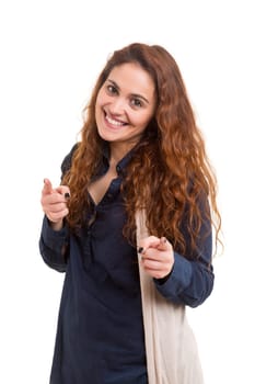 Young beautiful woman pointing at you, isolated over white