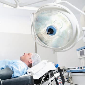 Patient lying on an operation table