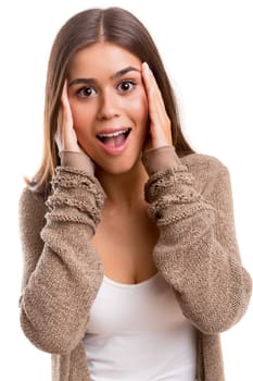 Surprised young woman isolated over white background