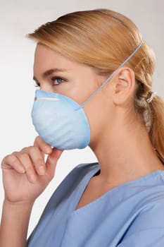 Female doctor wearing a flu mask