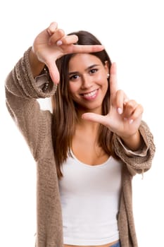 Young woman making framing key gesture - isolated over white