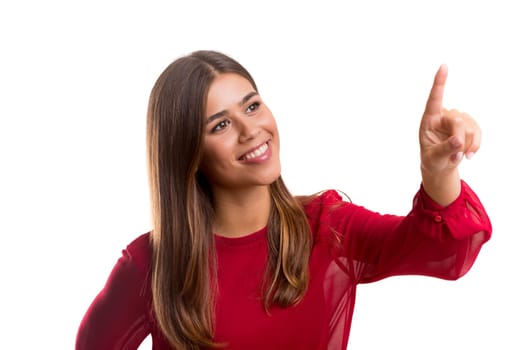 Young beautiful woman presses key, isolated over white