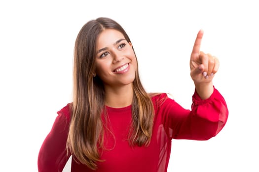 Young beautiful woman presses key, isolated over white