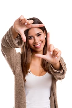 Young woman making framing key gesture - isolated over white