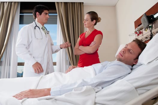 Woman discussing with a doctor