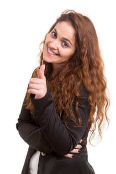 Young beautiful woman pointing at you, isolated over white