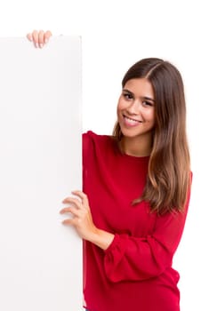Beautiful young business woman presenting your product on a white card
