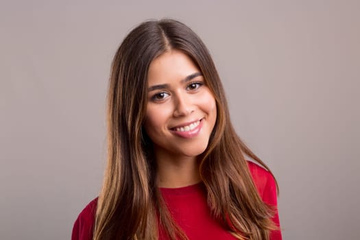 Studio shot of a beautiful young casual woman