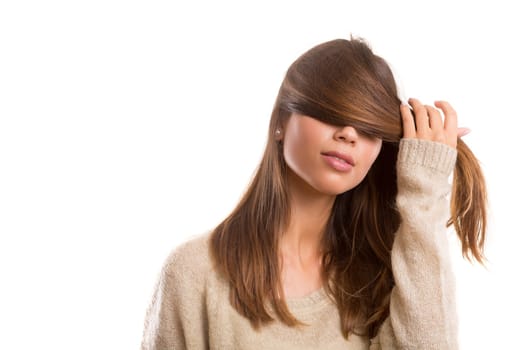 Studio shot of a beautiful young casual woman
