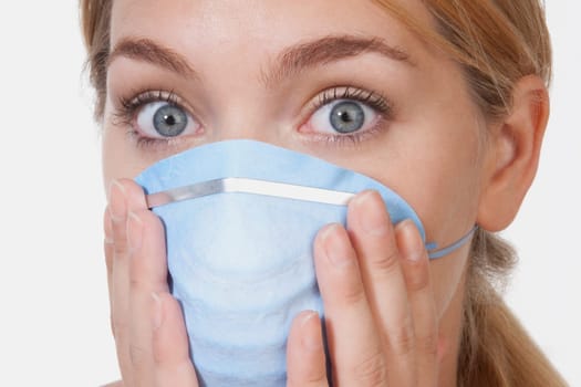 Female doctor wearing a flu mask