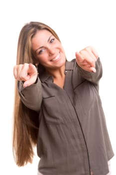 Young beautiful woman pointing at you, isolated over white