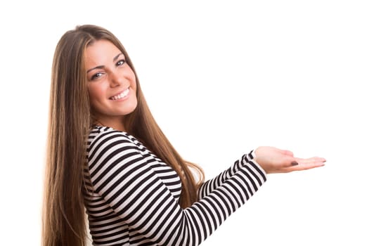 Young beautiful woman presenting your product, isolated over white background