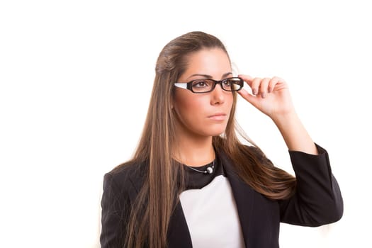 Beautiful young woman wearing glasses, isolated over copy space background