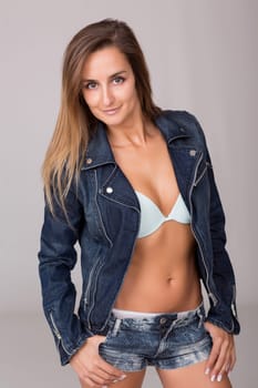 A Young sexy woman posing in studio
