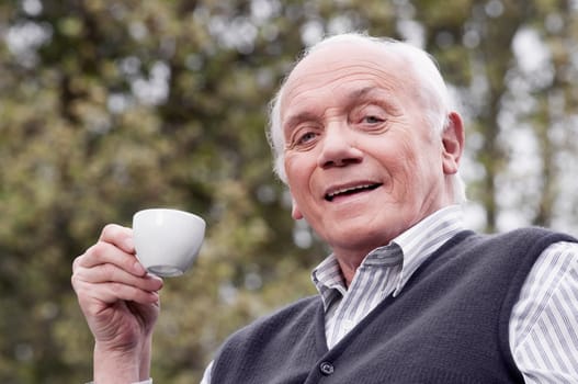 Portrait of a man drinking tea