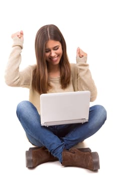 Young student working with her laptop, isolated over a white background