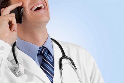 Close_up of a doctor talking on a mobile phone