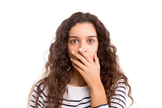 Surprised young woman isolated over white background