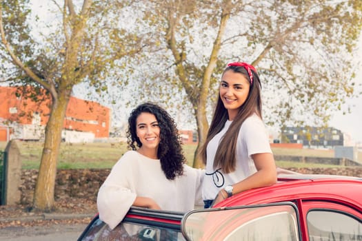Two friends going on a roadtrip through countryside