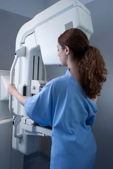 Woman getting mammogram