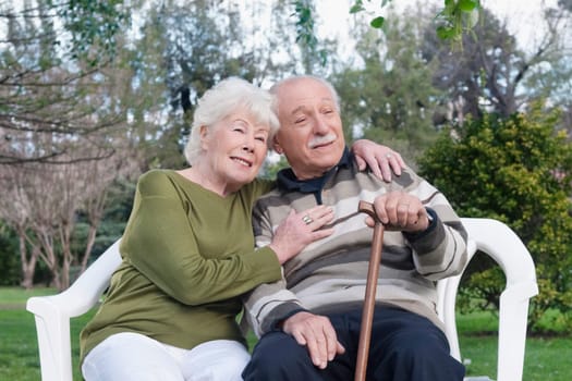 Couple sitting together in a park